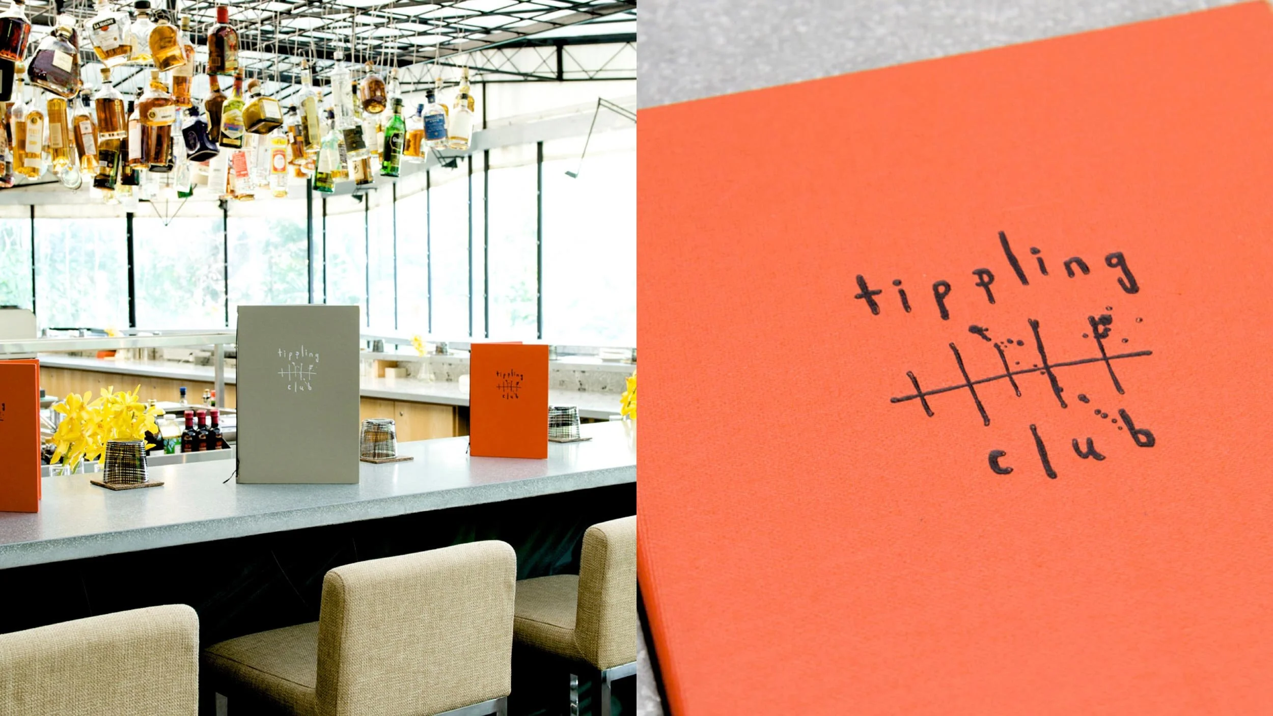 Tippling Club menus in light grey and orange sit upright on a bar top at Tippling Club in Dempsey Hill, Singapore (left) and a close-up of an orange buckram Tippling Club menu bearing their logo embossed in black on the front (right).