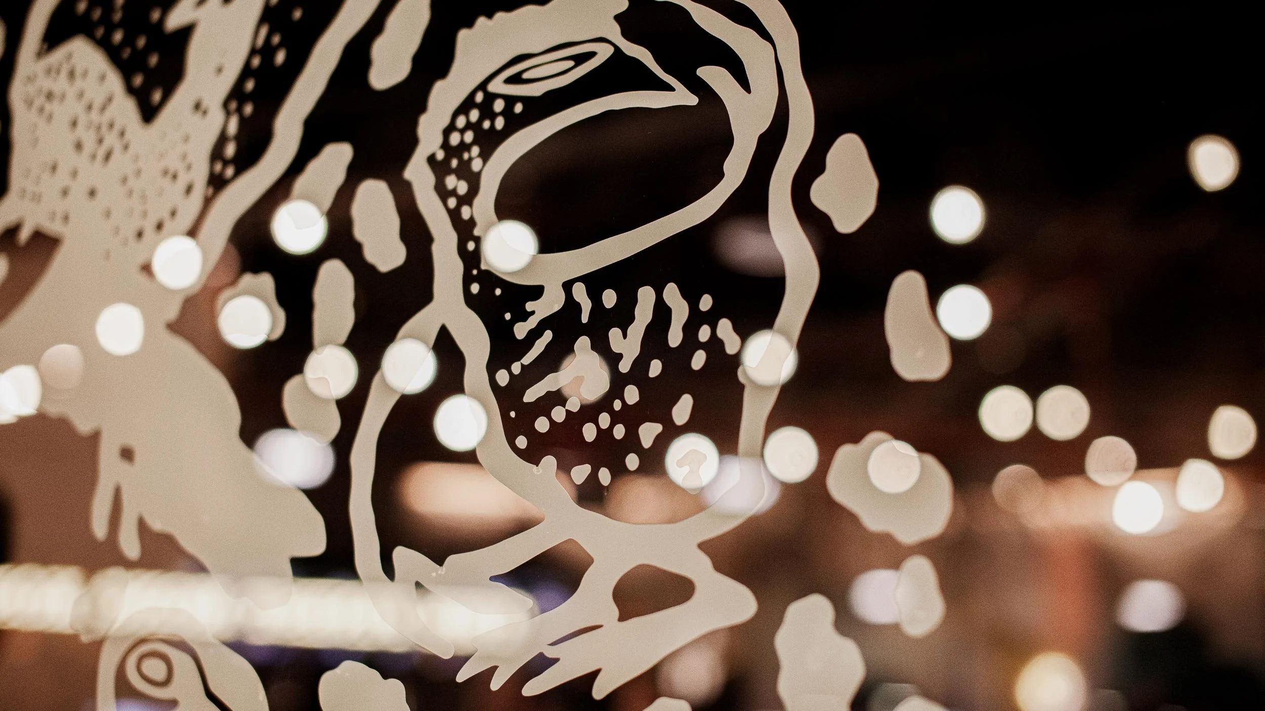 Closeup of one of the birds in the decal on the Byrdi window.