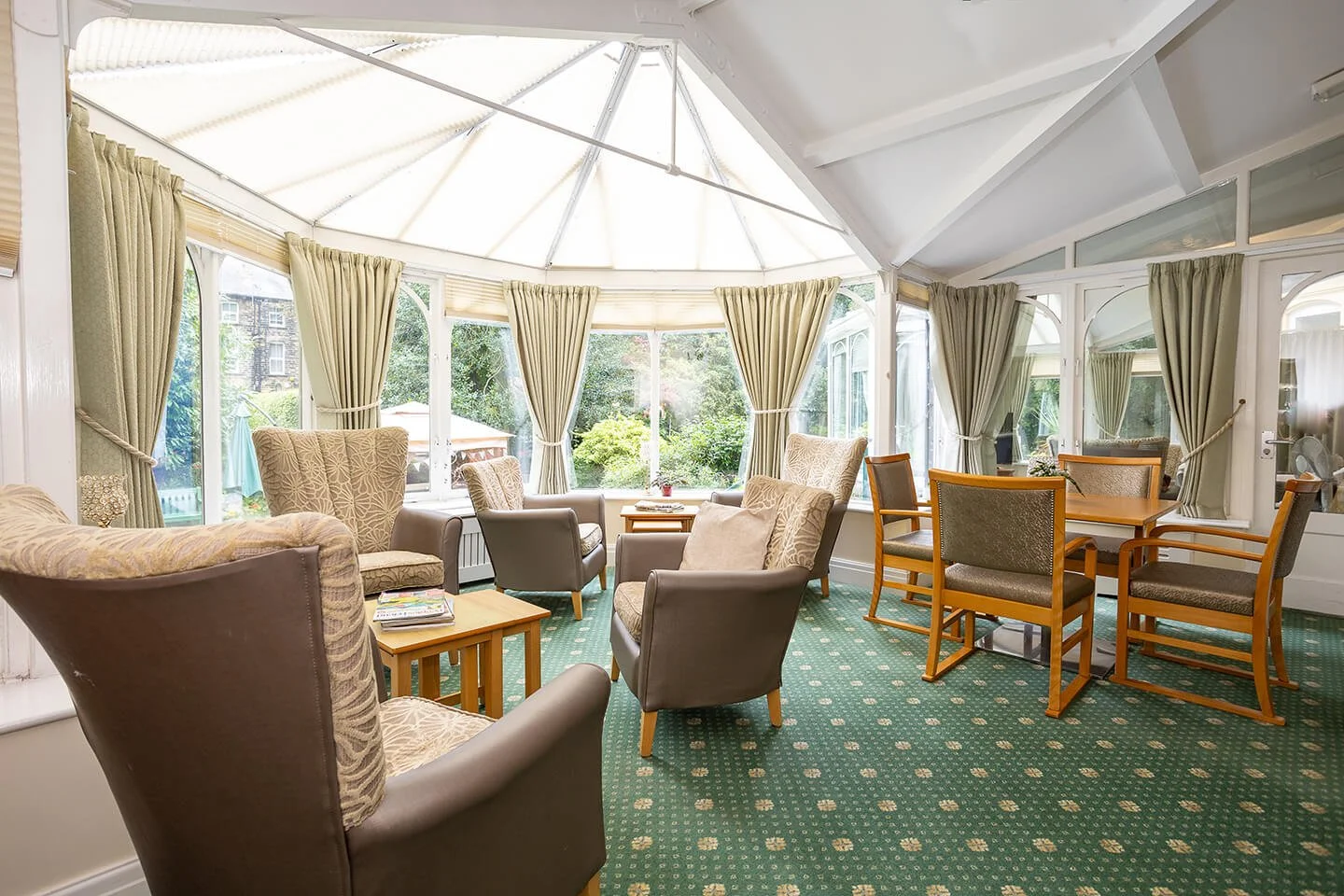 Inside the conservatory looking out to the garden