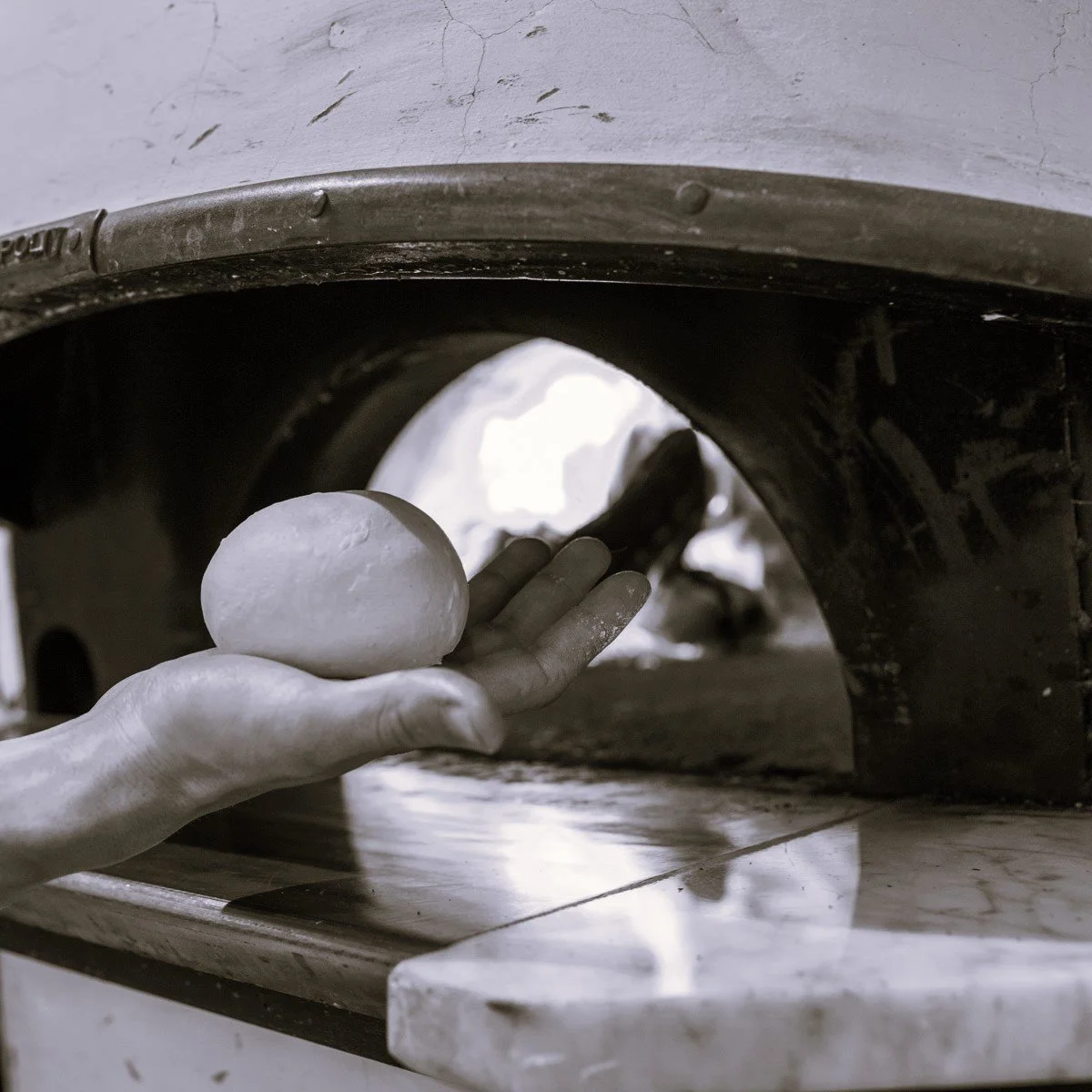 A pizza ball and a woodfire oven