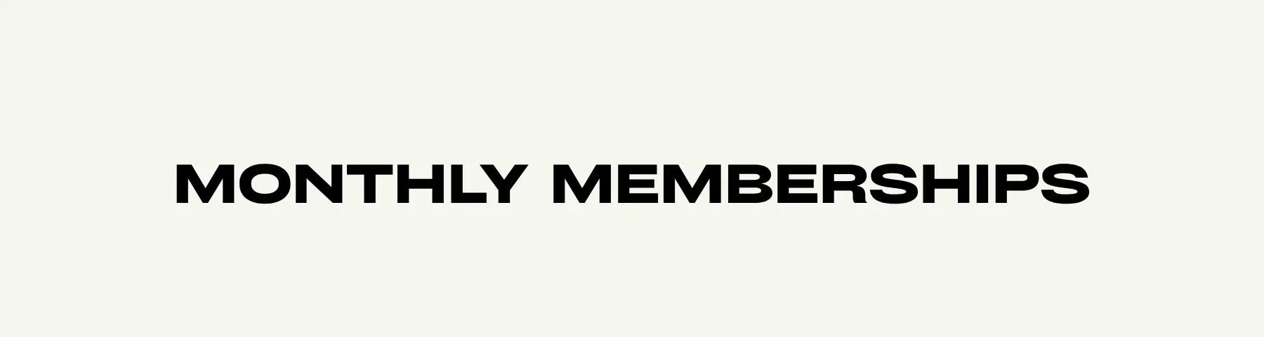 Text that says 'Monthly Memberships' in bold black font on a light background.