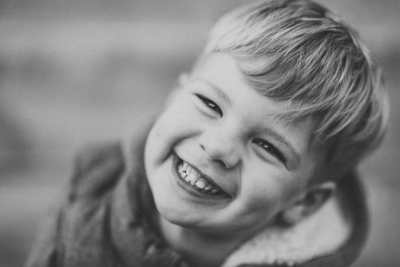 pre+school+aged+boy+smiling+at+camera.jpg