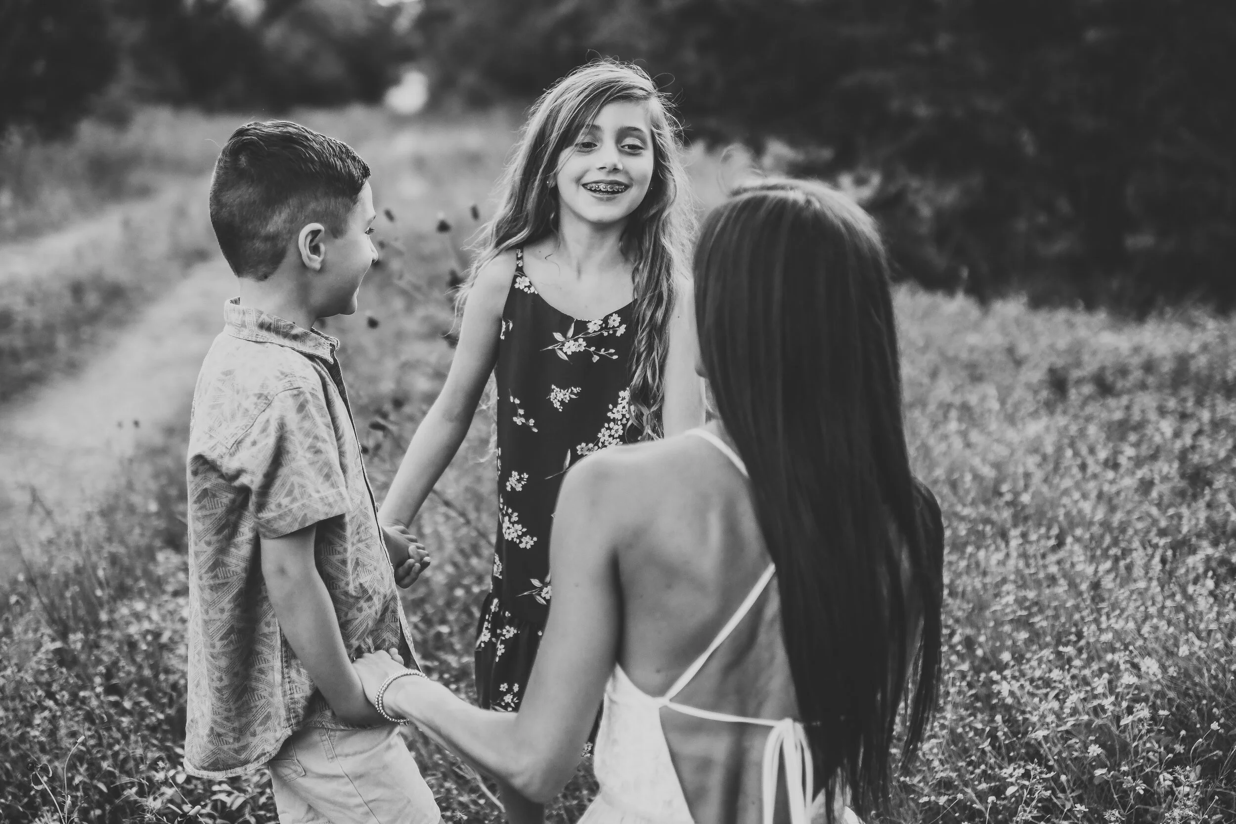 mother+and+kids+in+circle+in+black+and+white.jpg