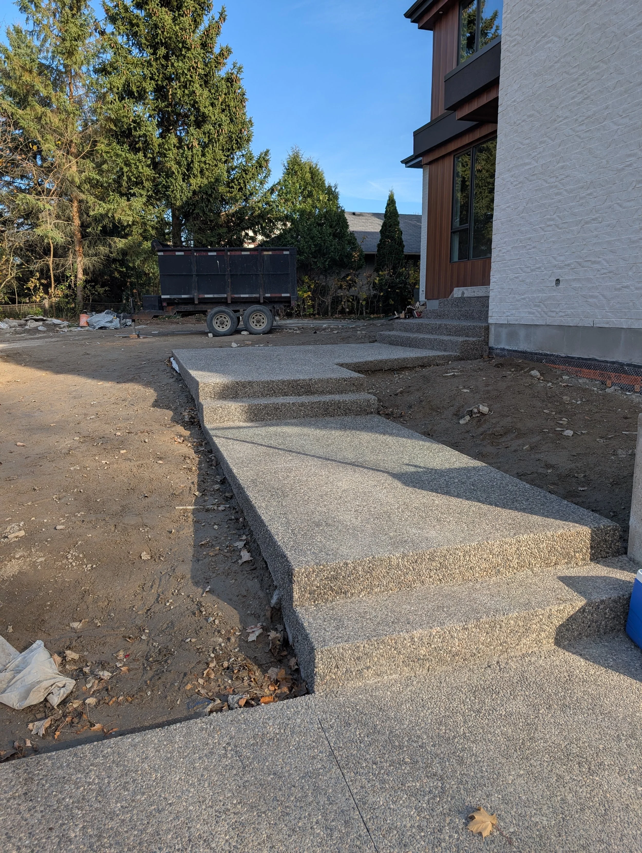 Brown rocky top heated concrete steps walks and driveway.jpg