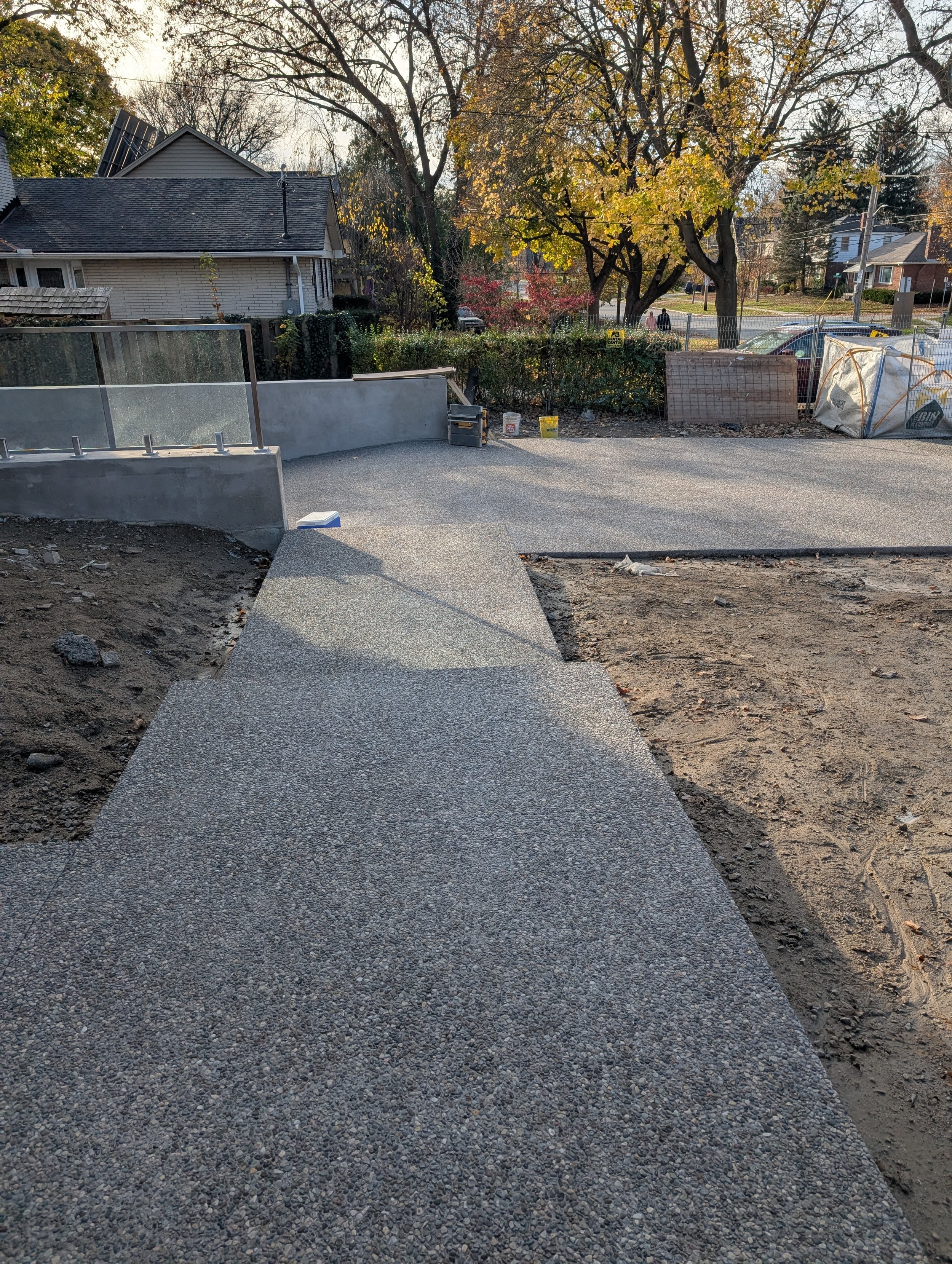Brown rocky top heated concrete sidewalk.jpg