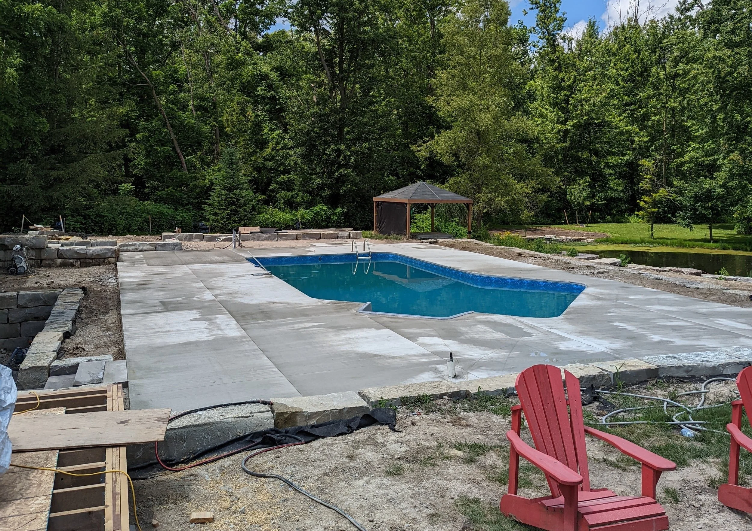 New plain concrete pool deck..jpg