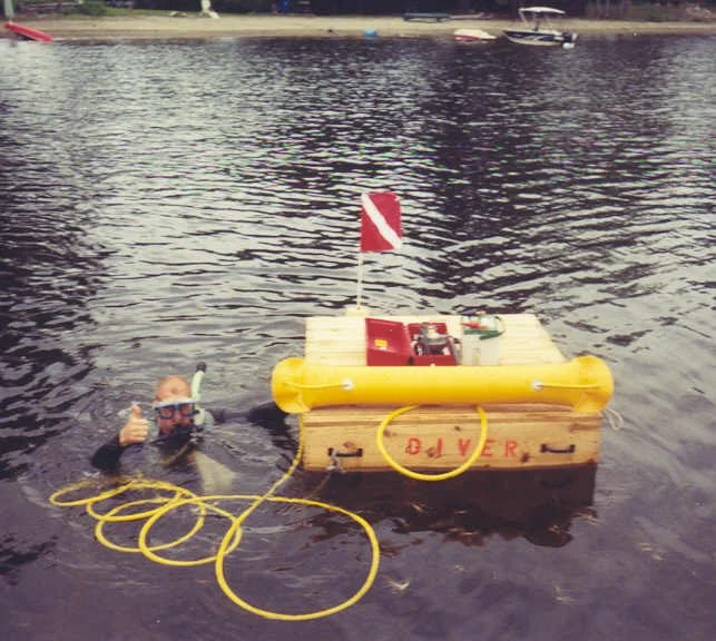 Pro divers going in for Milfoil