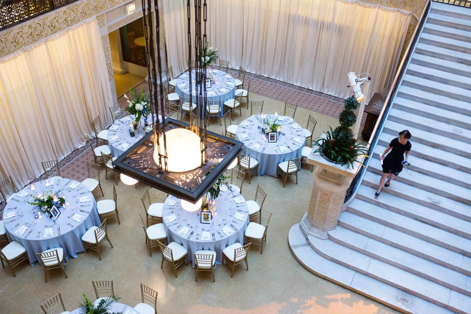 An event planner passes through the dining room set up at the Rookery in Chicago. 
