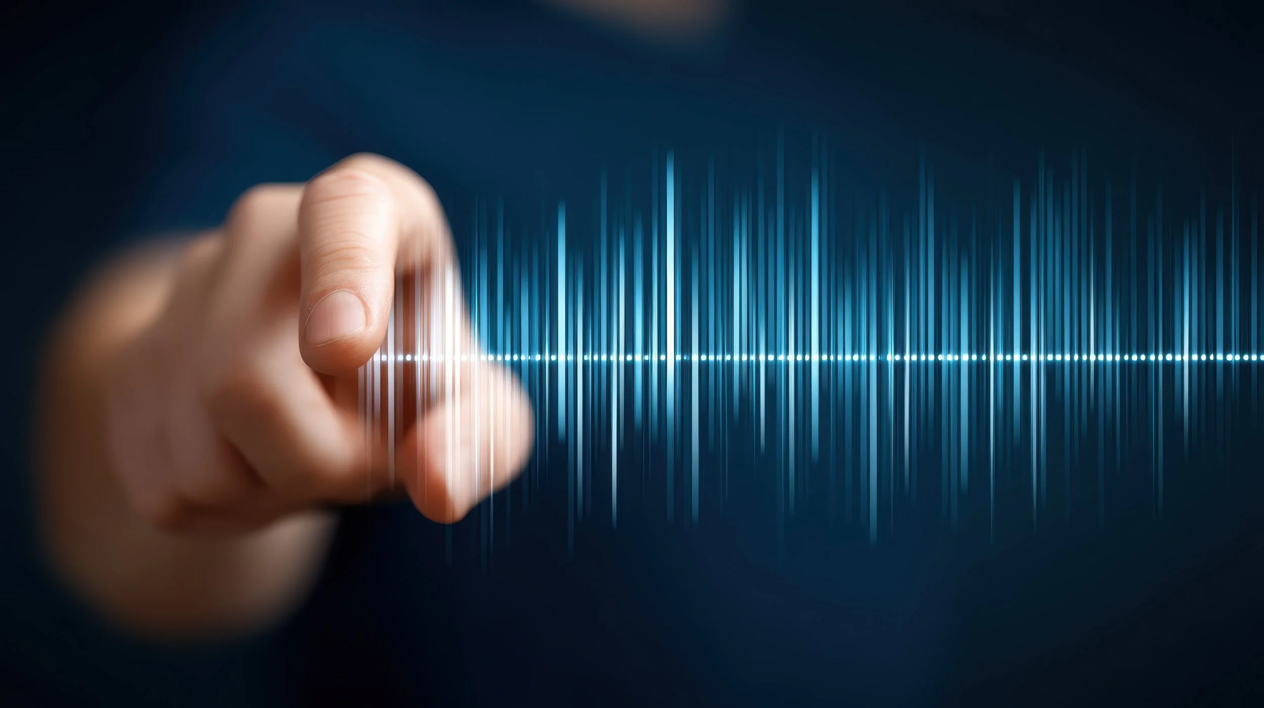 hand pointing at sound waves