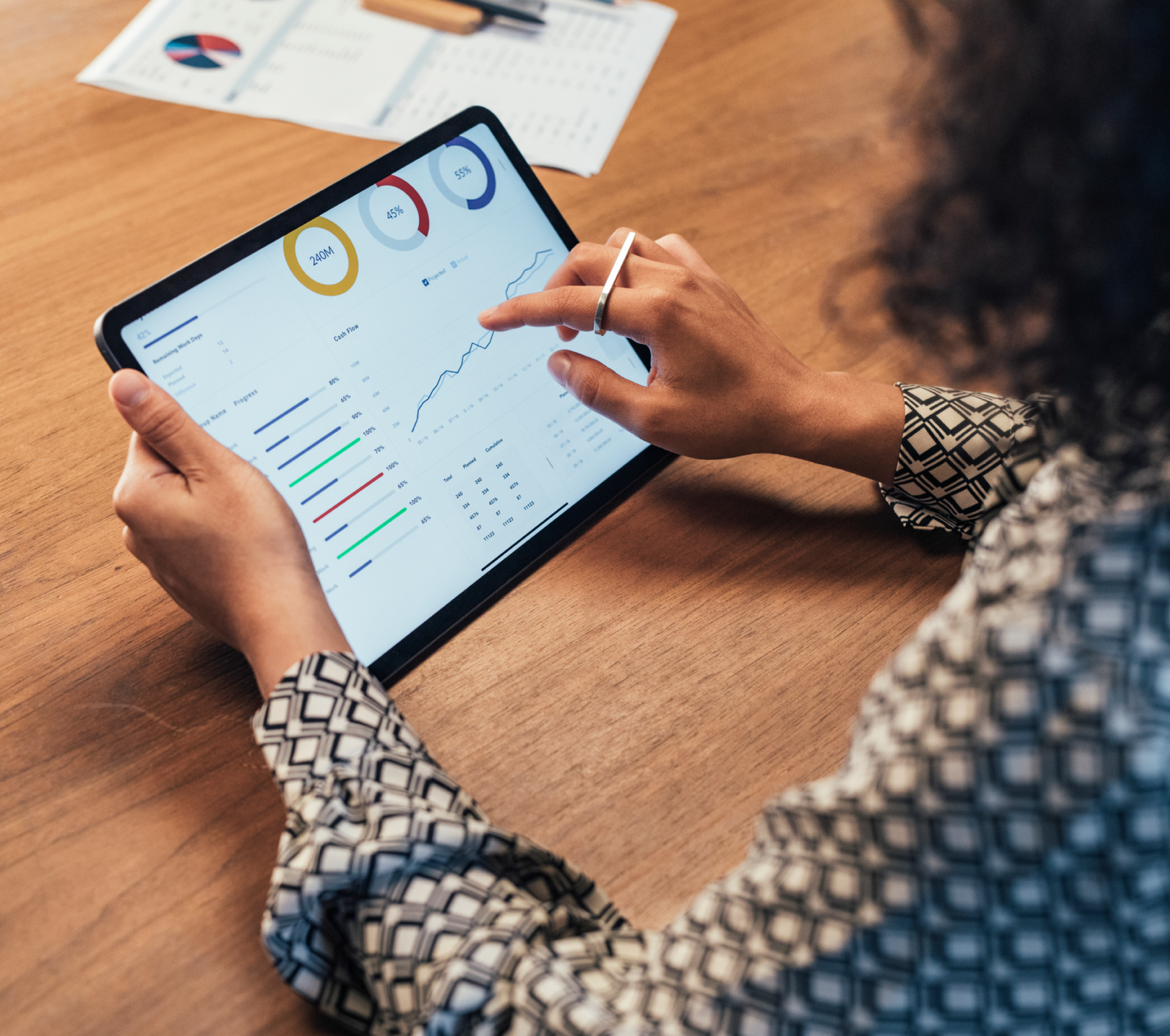 image of a woman looking through data and analytics