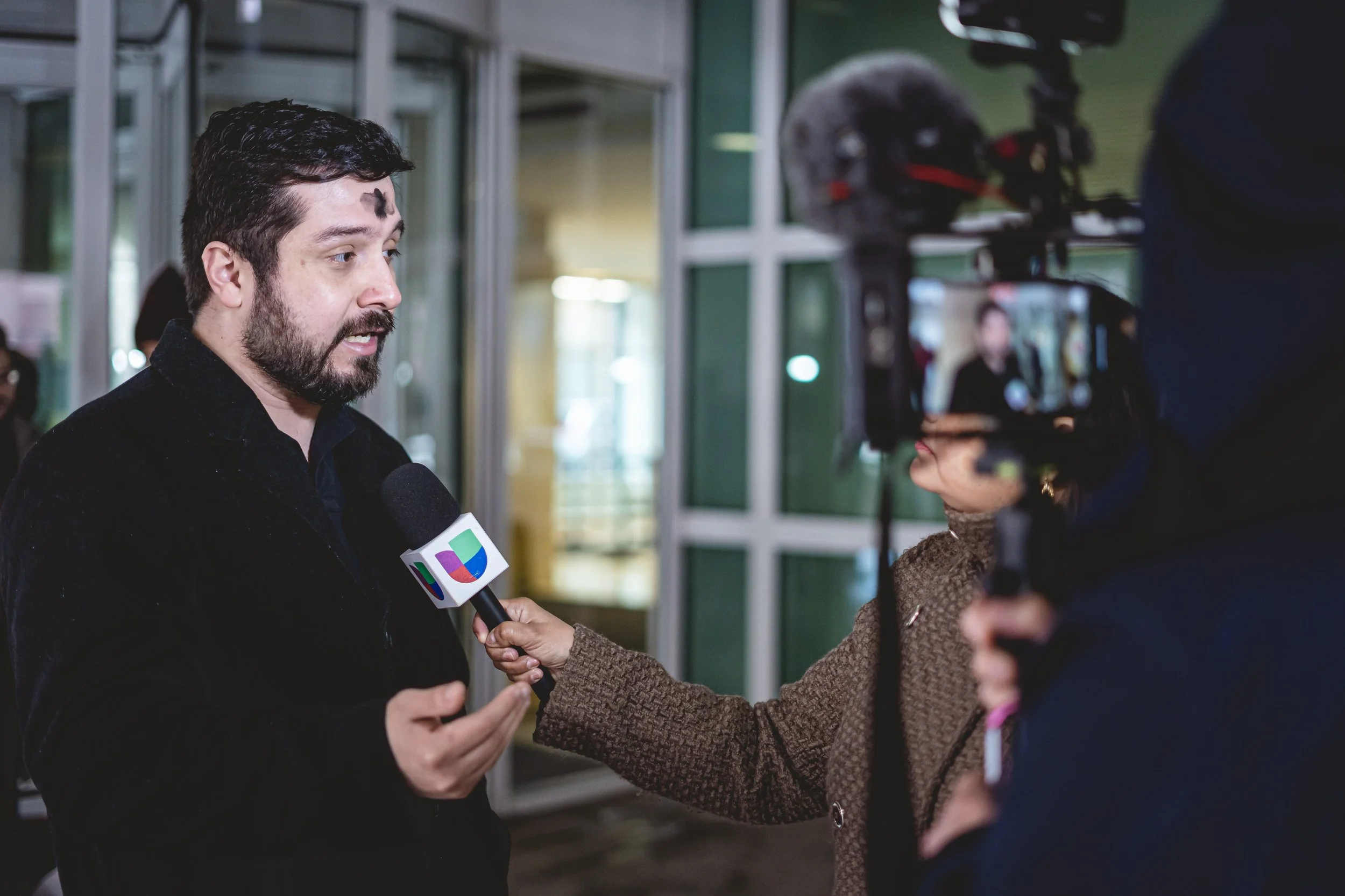 CSPL former Board member and current staff member Pablo Montalvo speaks to Telemundo at the March 2025 Ash Wednesday action