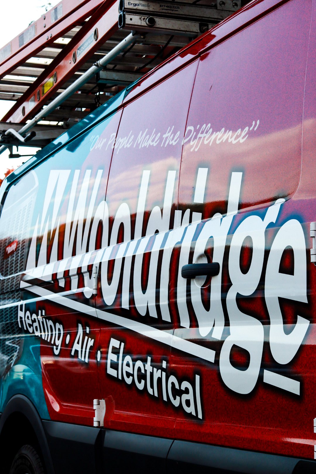 Up Close Wooldridge Wrap and Logo on Van