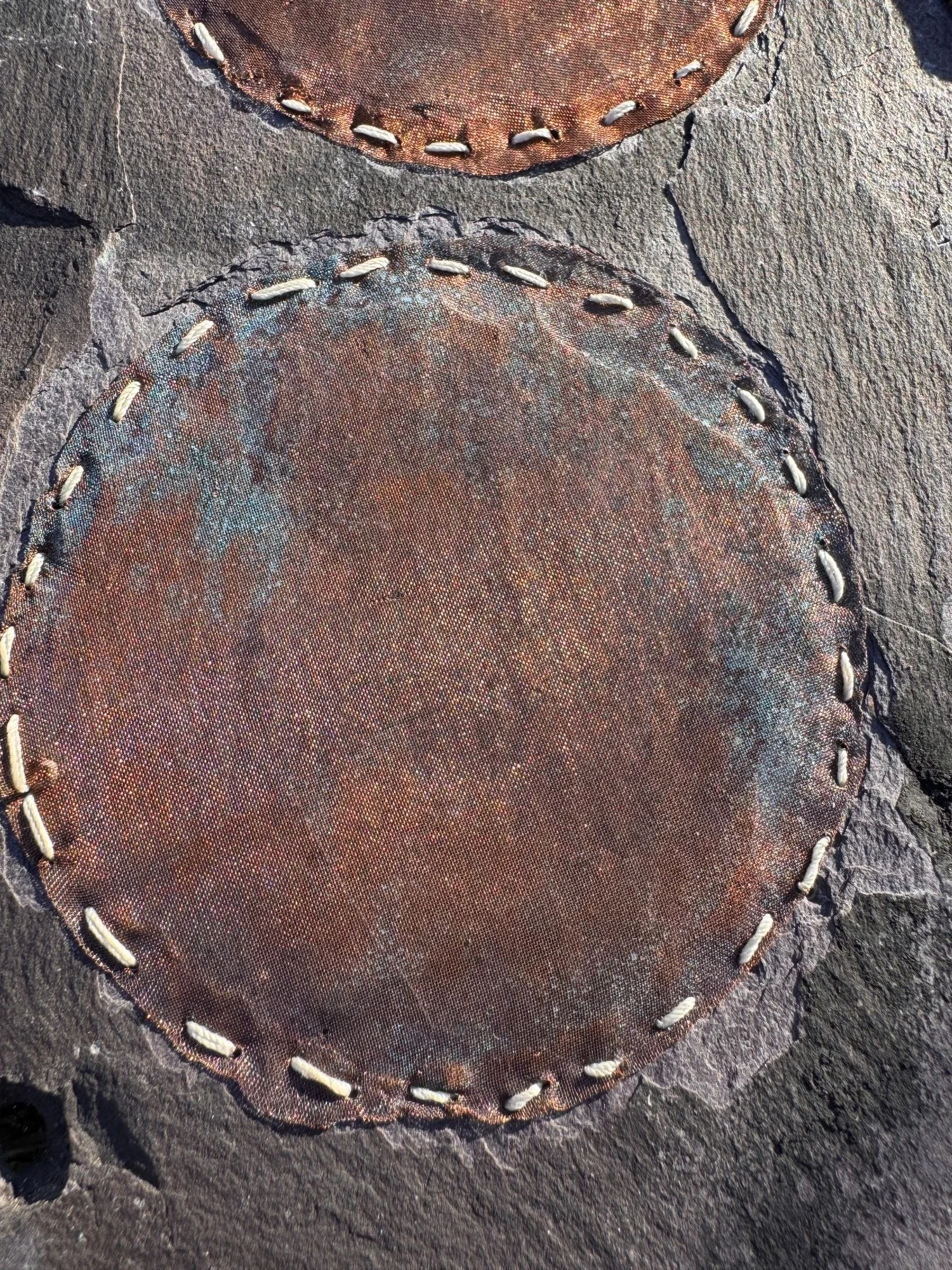 Stitching on copper circle.JPG
