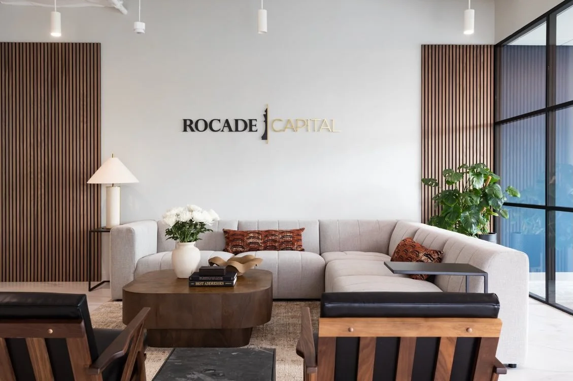 When Rocade Capital came to us, they had been in their office for about a year, but the lobby was still sitting mostly empty. They knew they wanted it to feel more welcoming, they just weren&rsquo;t quite sure what to do with it.

The goal was to cre