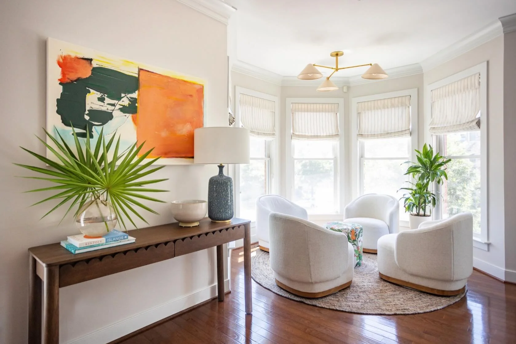 Ten years in this home and this might be the first time this window is getting the attention it deserves.

This octagon-shaped bay looks out over the Navy Yard and is prime people-watching territory, so we created a sitting area with four small-scale