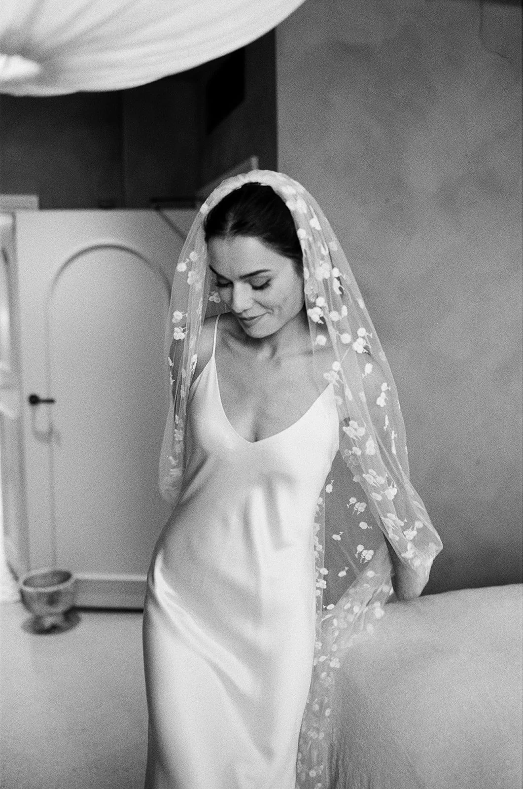 A bride getting ready at The Bull in Burford for her wedding at Worton Kitchen Garden