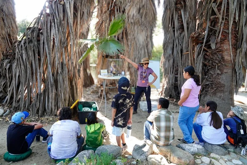 California Botanical Garden docent Kyra Saegusa explains “The Web of Life” to CLASP students.