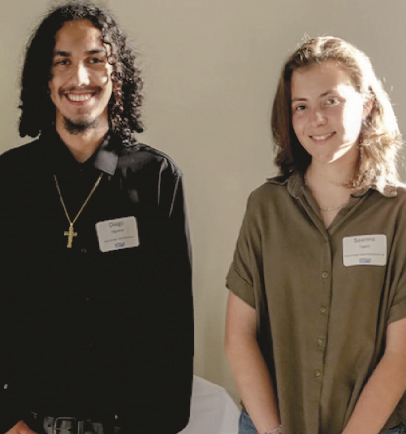 Diego and Seanna standing side by side.