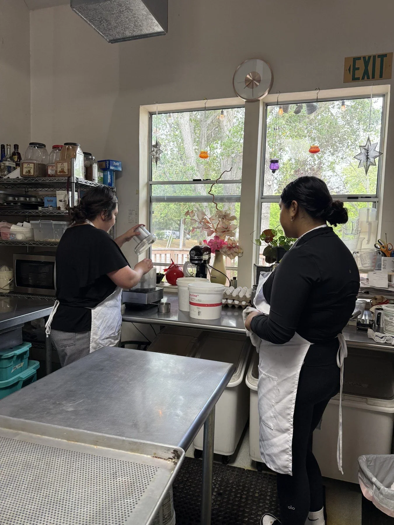 Students practicing skills in a teaching kitchen · Magnolia programs