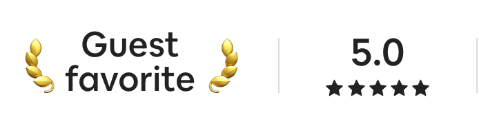 Rating label with the text "Guest favorite" and a 5.0 star rating, decorated with gold wheat graphics.