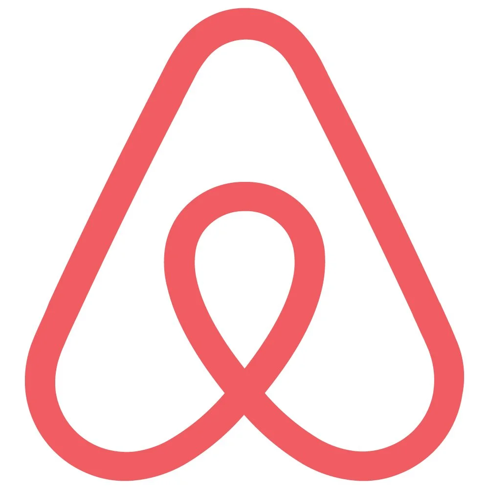 Red and white logo resembling an abstract heart shape, with a rounded outline and a loop inside.
