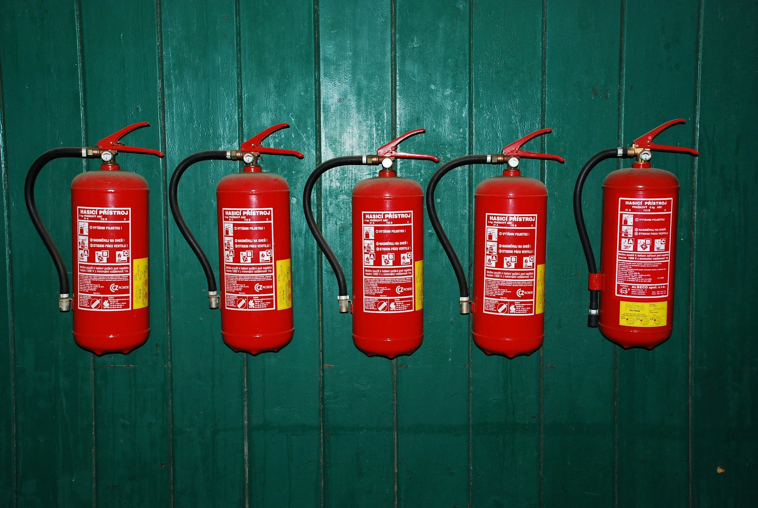 Fire Extinguisher tags in a business needing them to pass inspection.