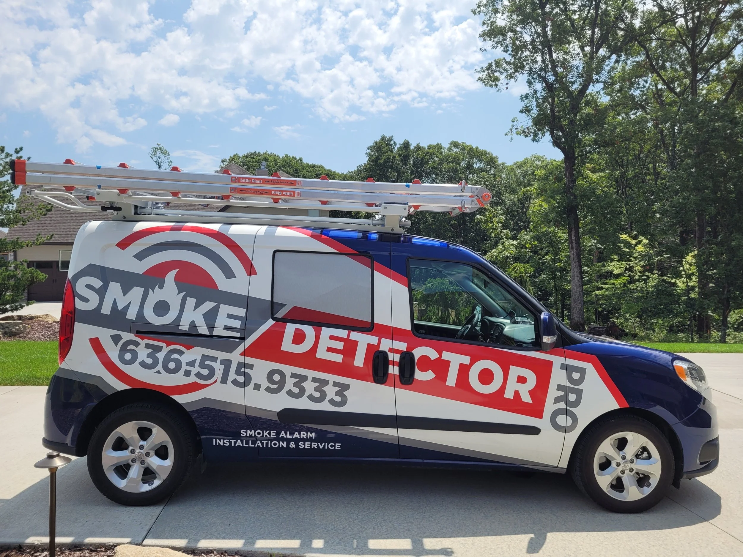 smoke detector pro at a home in Ballwin MO getting serviced