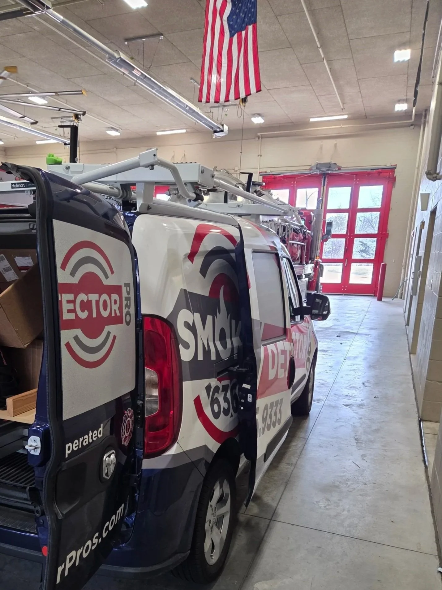 Professional smoke alarm inspection by firefighter