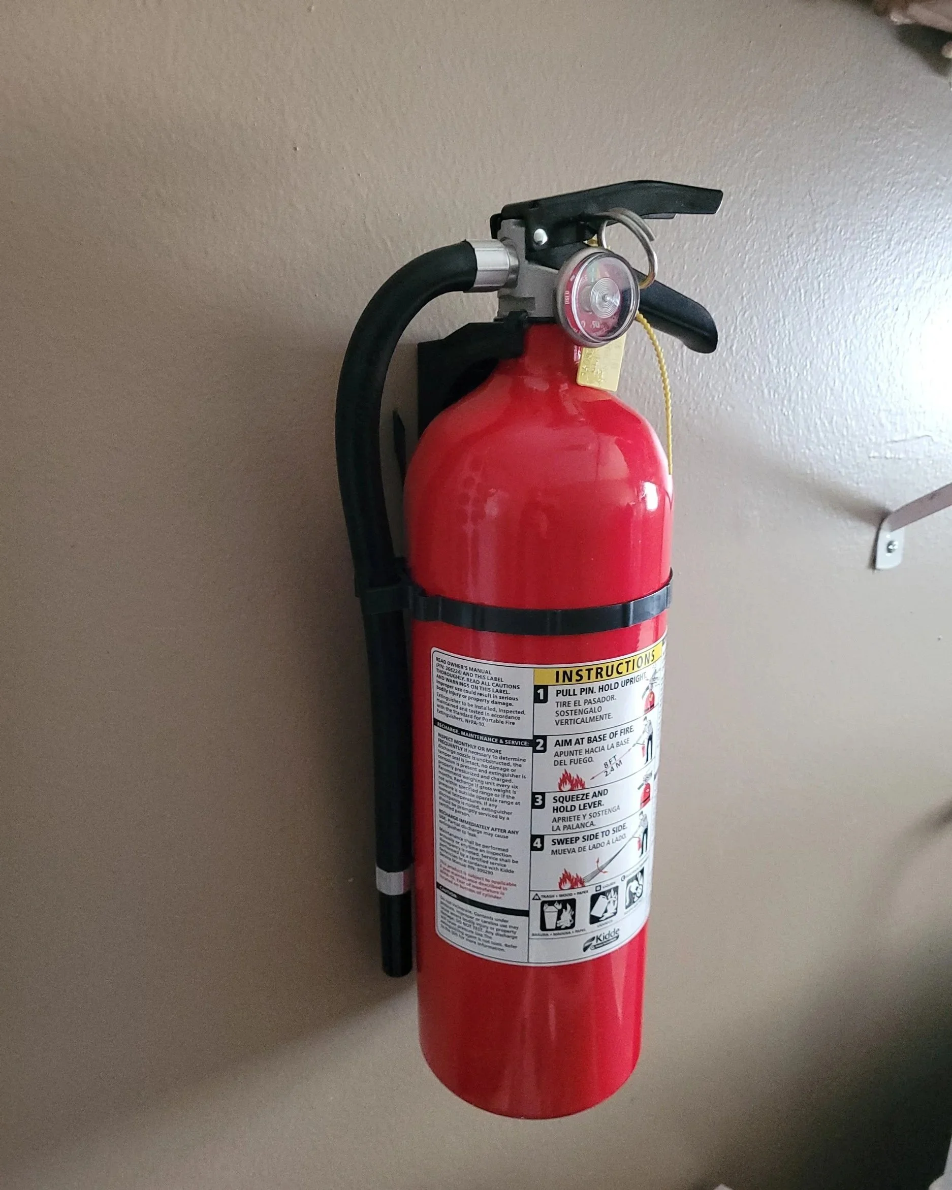 Servicing Fire Extinguisher picture