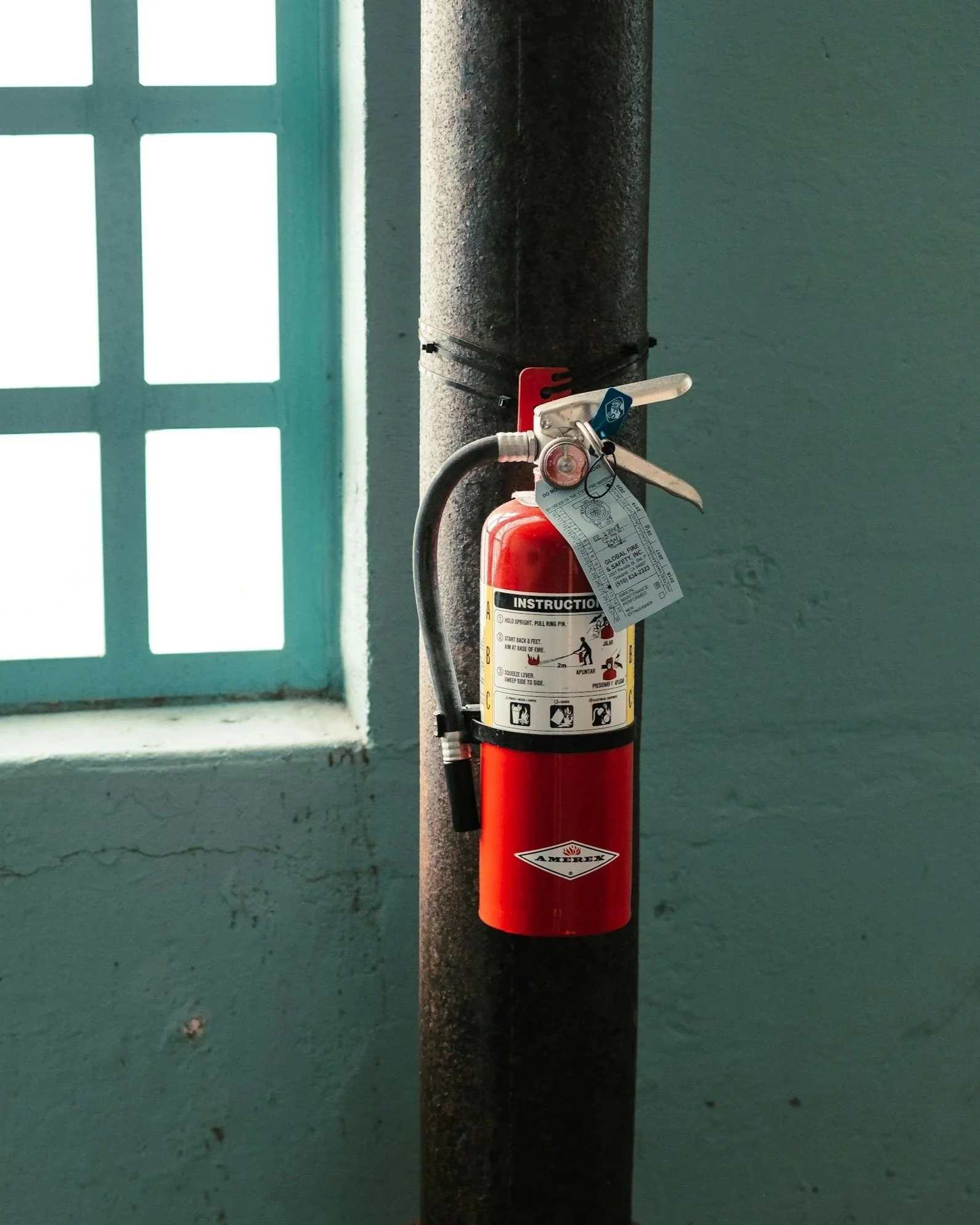 Servicing Fire Extinguisher picture