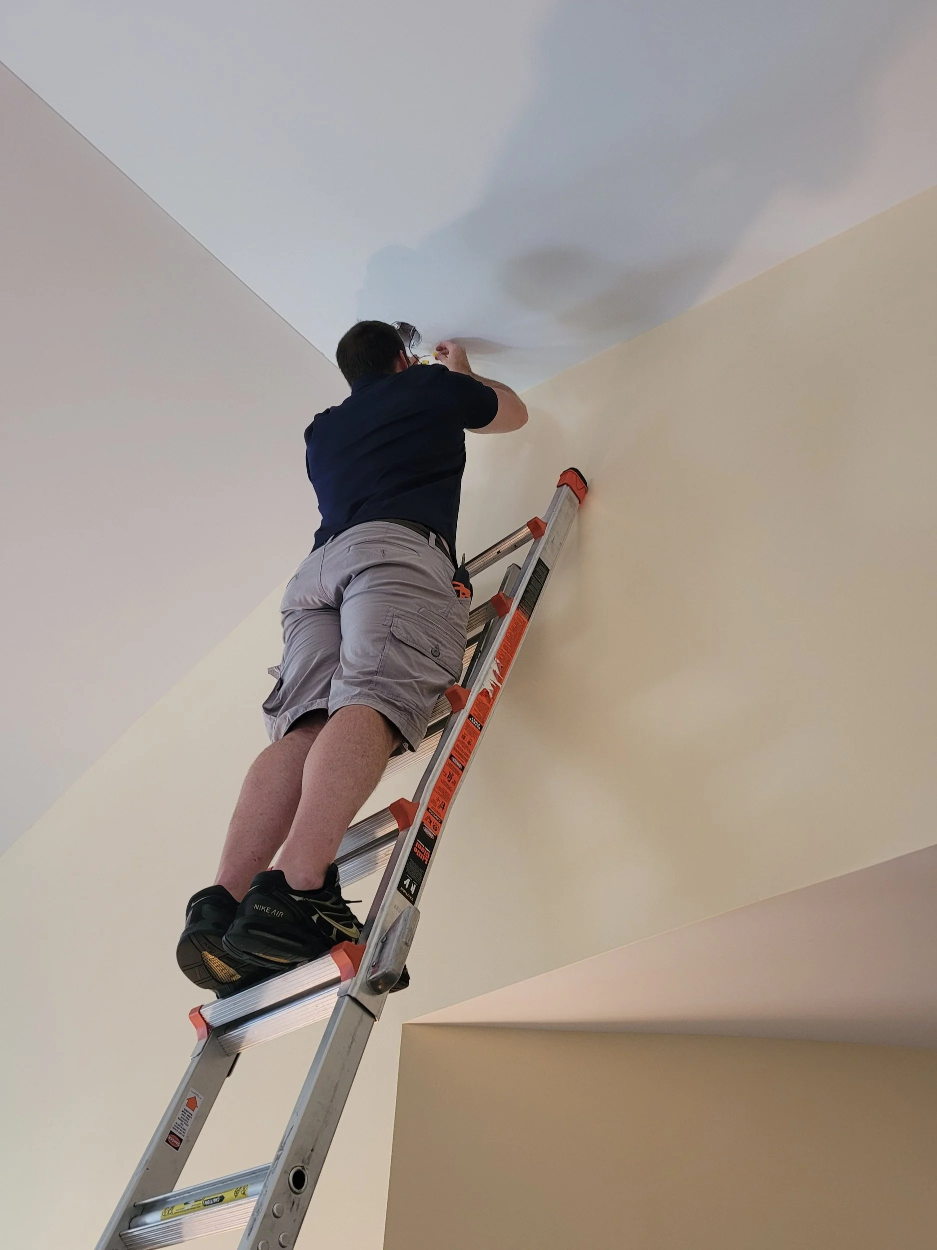 Owners of Smoke Detector Company showing service van