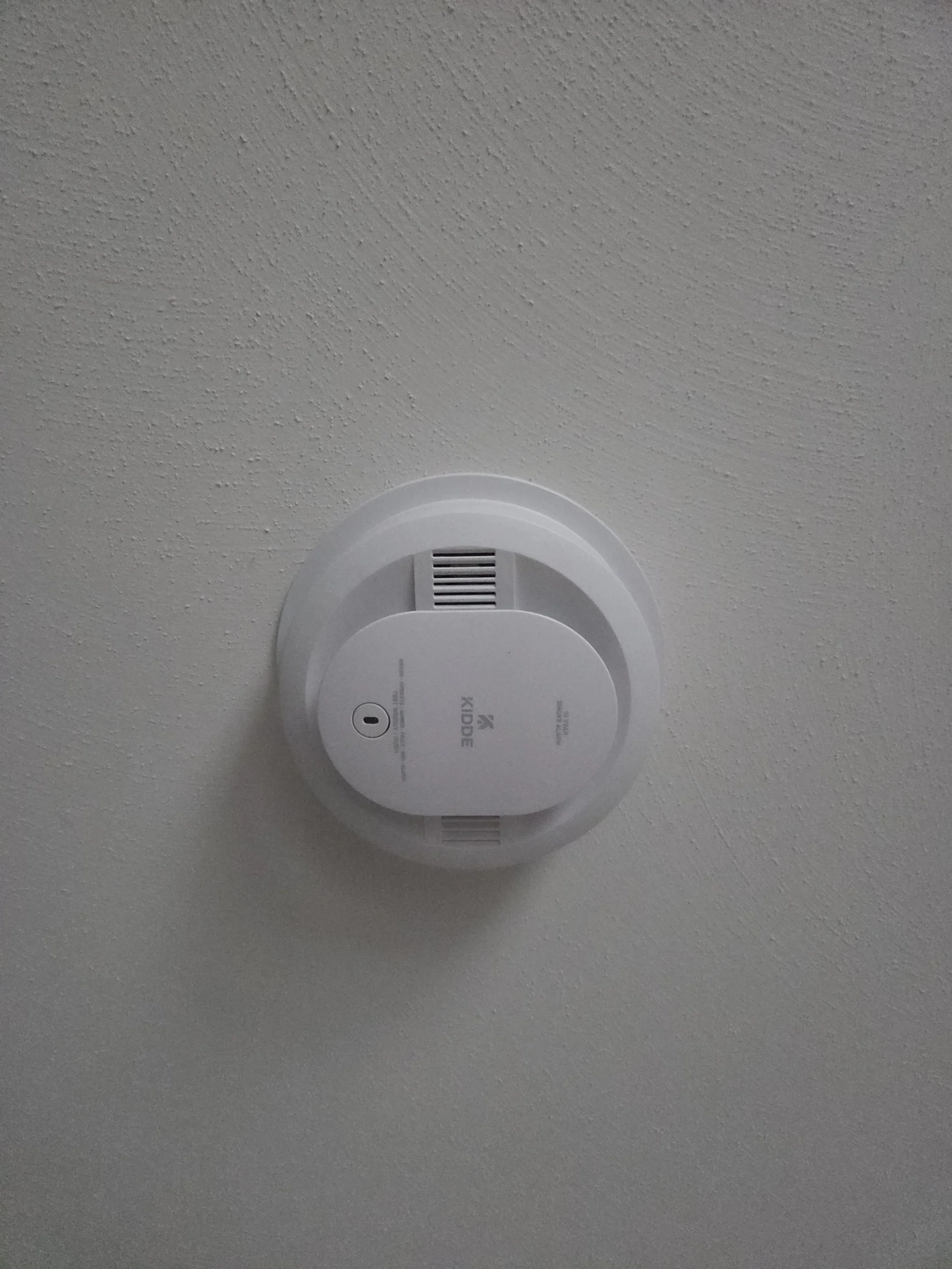 hardwired alarm connected to a wireless system making it code compliant