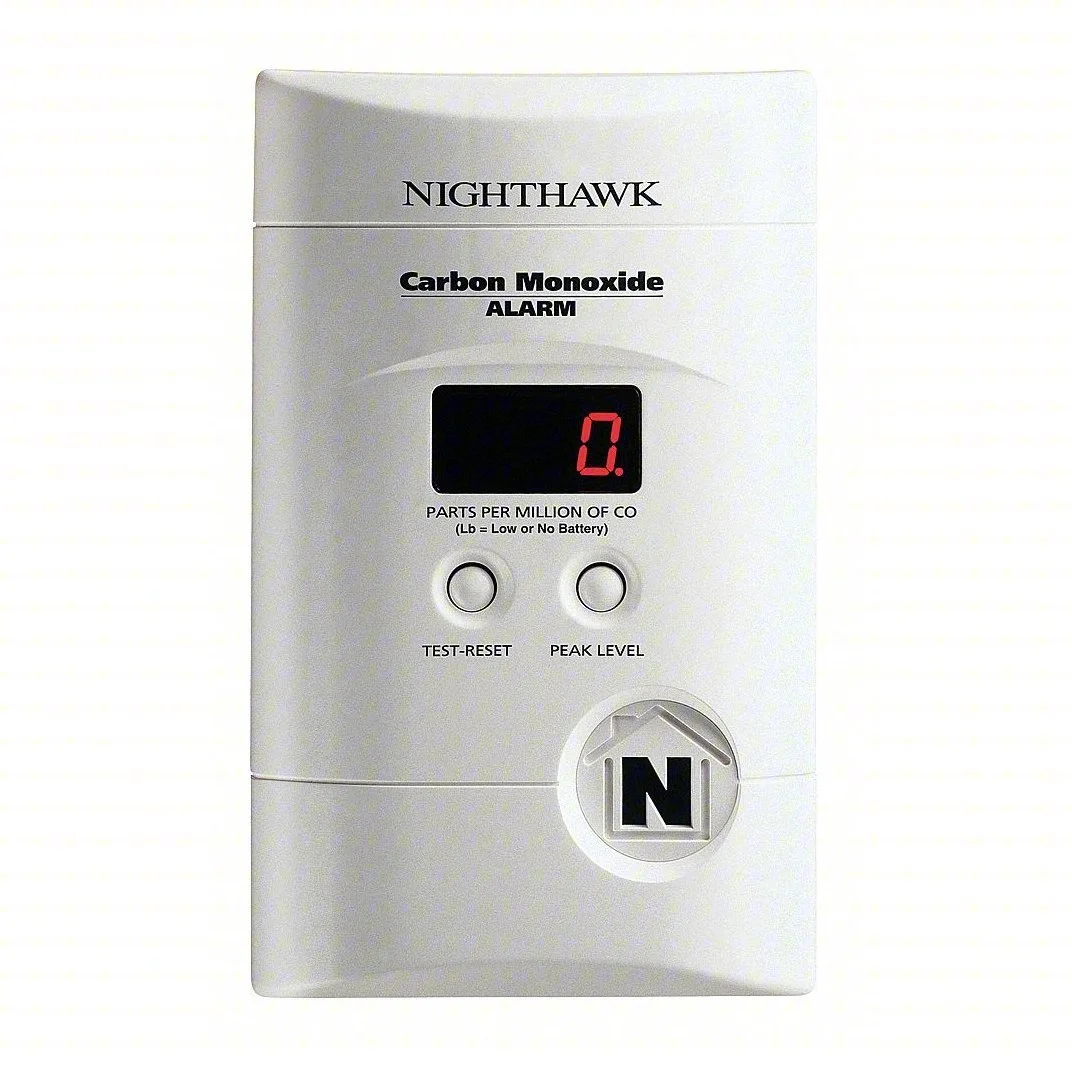 Old carbon monoxide alarm needing be replaced.