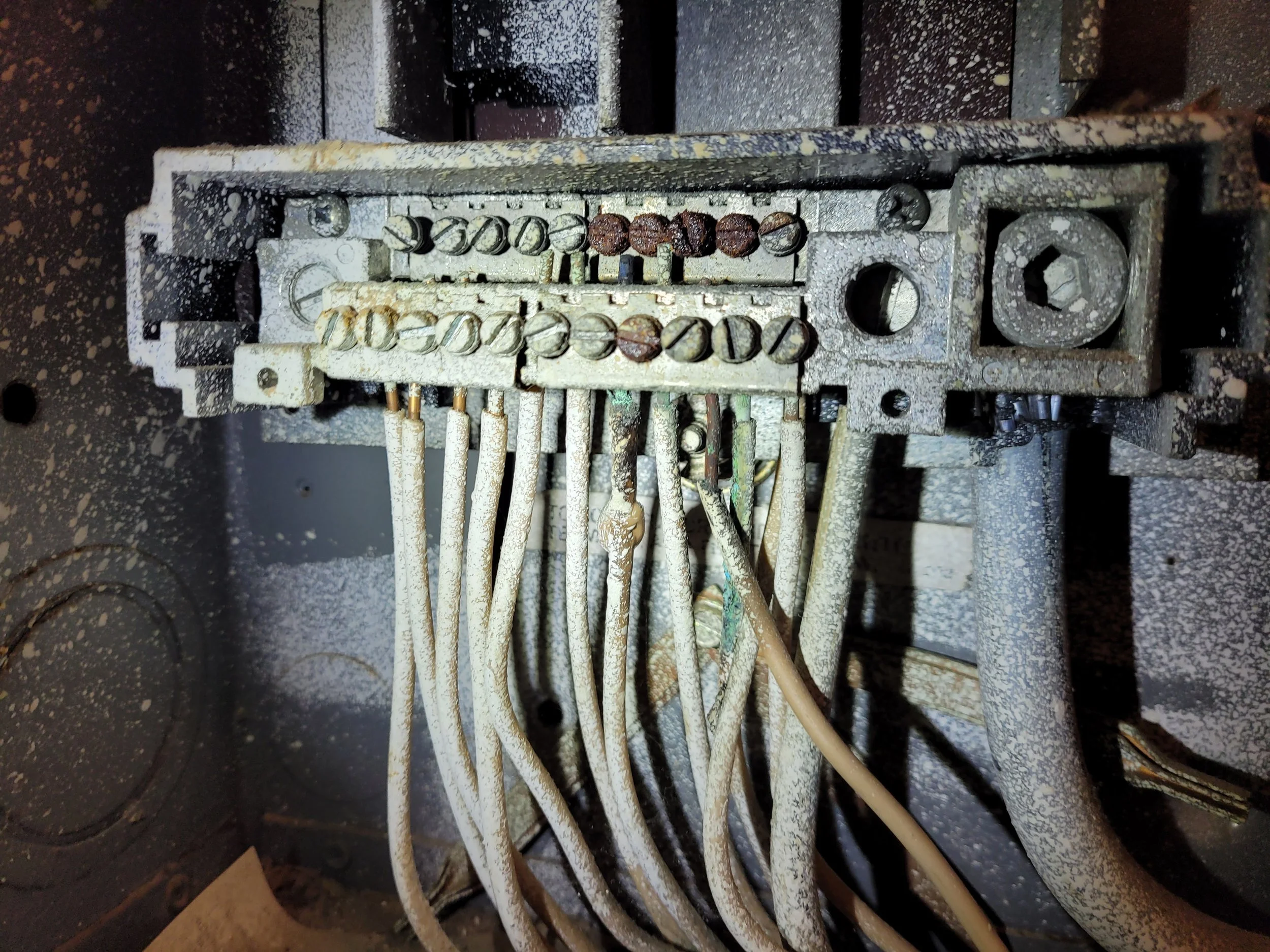 Significant rust and corrosion inside the electrical panel; back-to-basics inspection