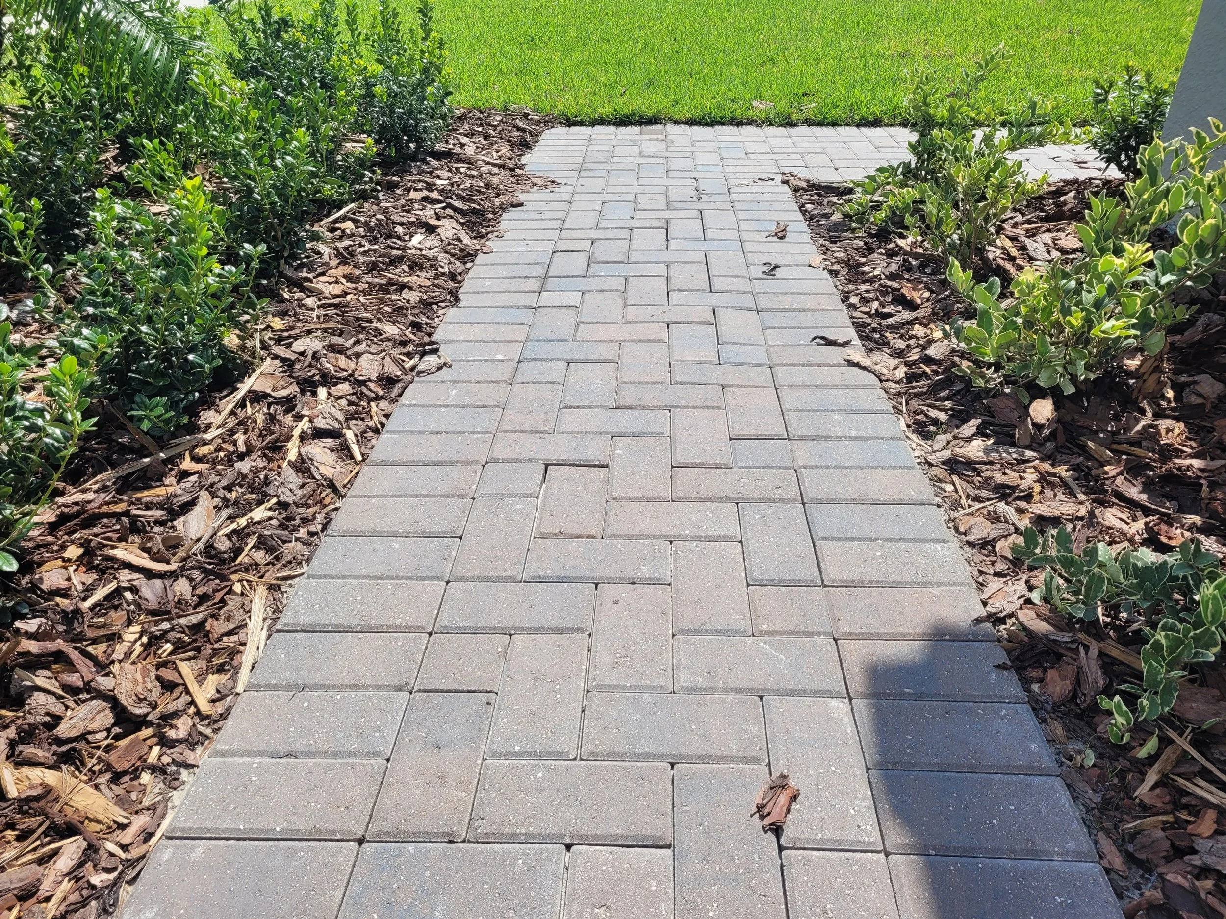 New Construction Inspection; uneven walkway pavers