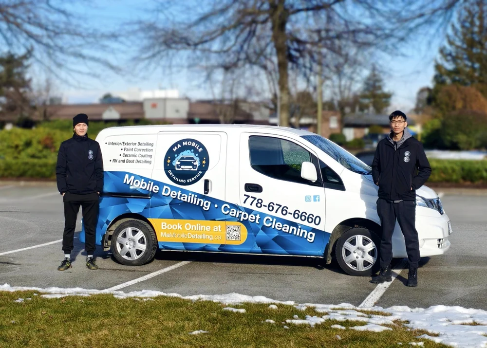 The Ma brothers beside the Ma Mobile Detailing service van