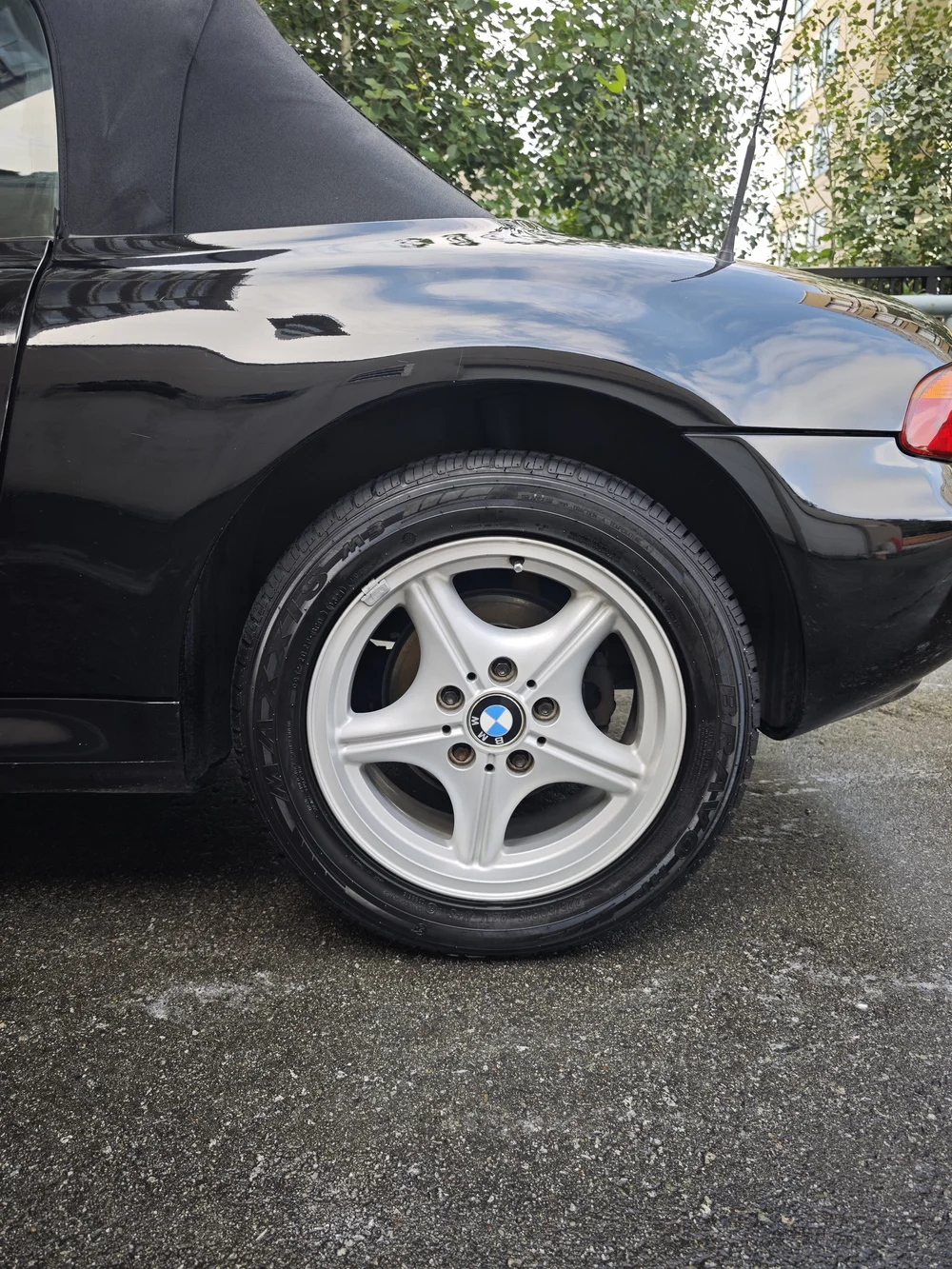 Black BMW wheel and front fender