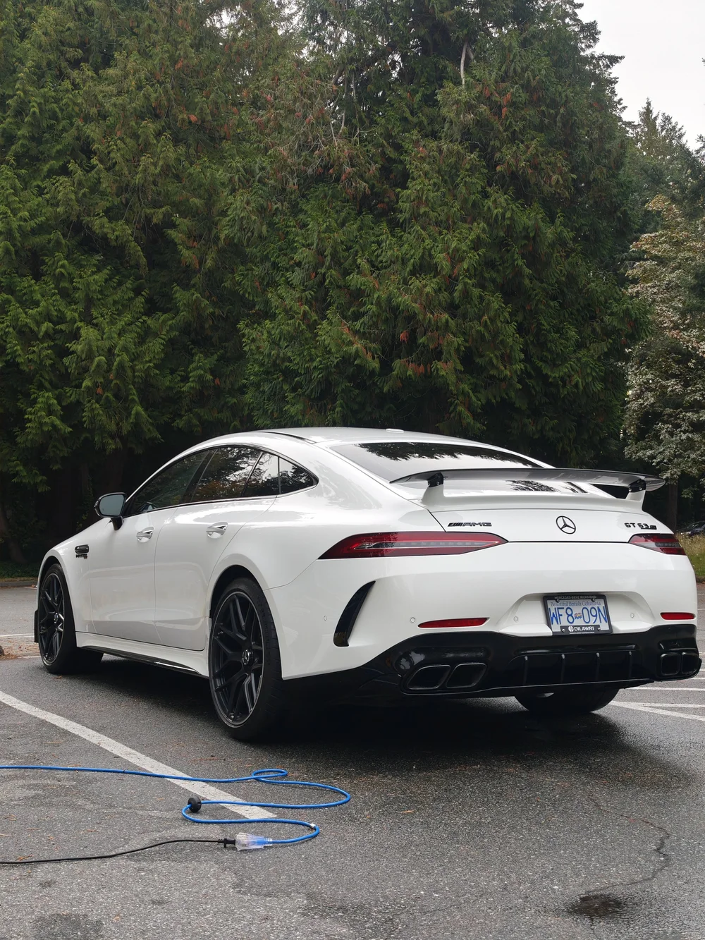 White Mercedes-AMG exterior in a parking area
