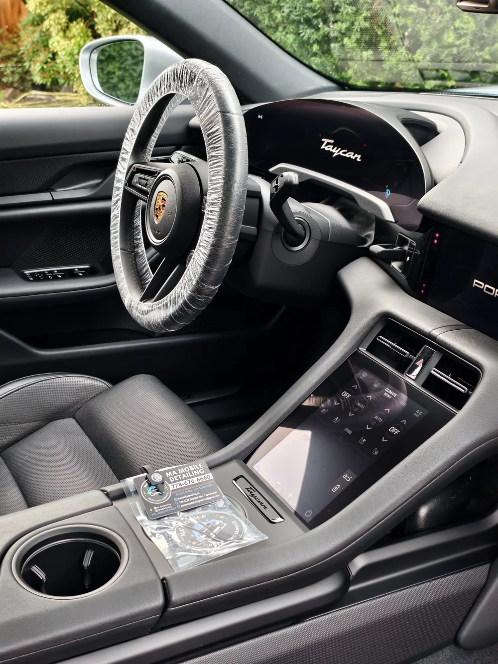 Porsche Taycan steering wheel, digital dashboard and console
