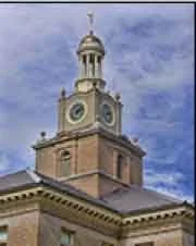 A historical building with blue sky behind