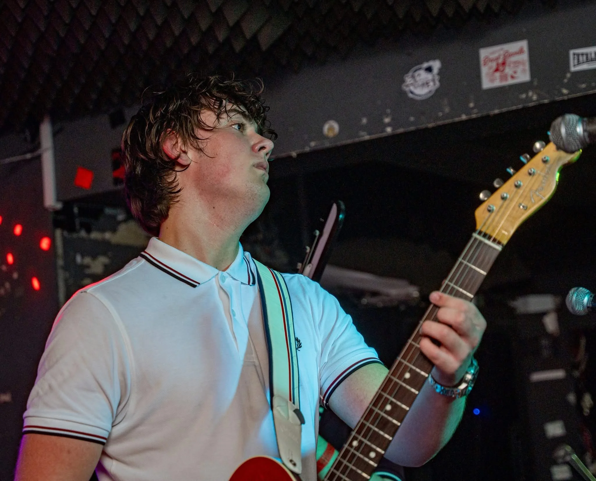 Finn Sexton looking into the audience on stage with Monumental