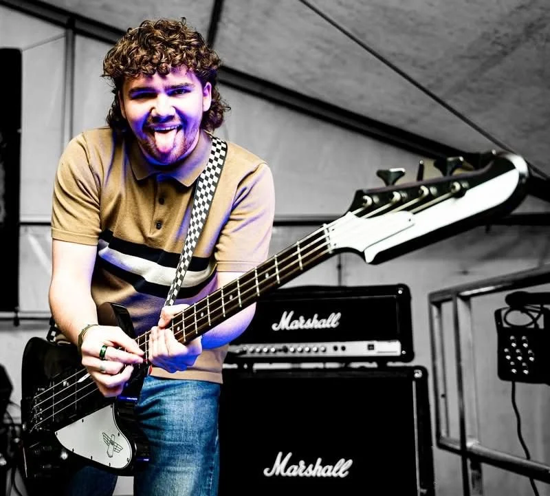 Nathan Bennett larking about on stage with Monumental