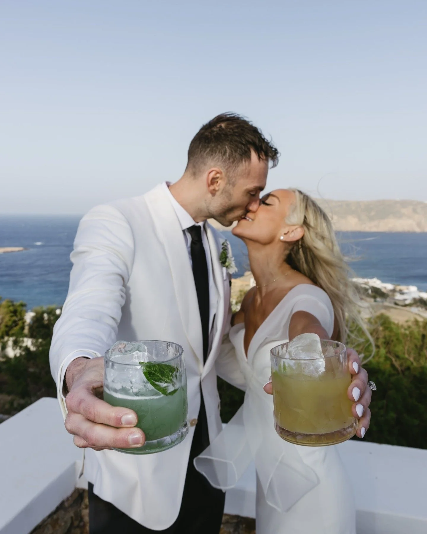 Our first international wedding! 
This was a challenge we were eager to take on, so we couldn't have been more excited when Amber and Jim chose to take their celebration across the sea to a private villa in Mykonos, Greece. Complete with authentic Me