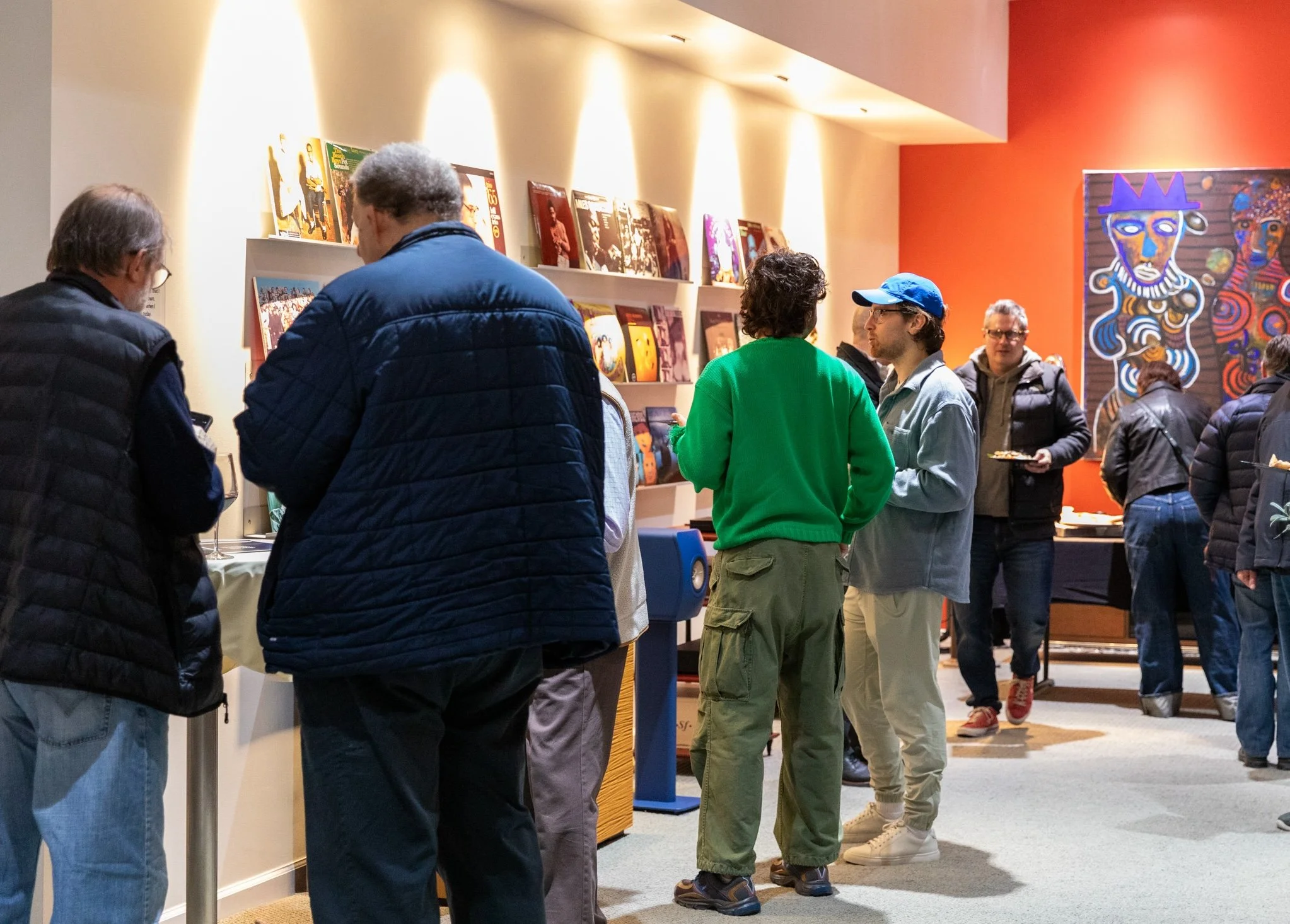 A party crowd in Stereo Stereo's entrance hall, in attendance at a previous listening party