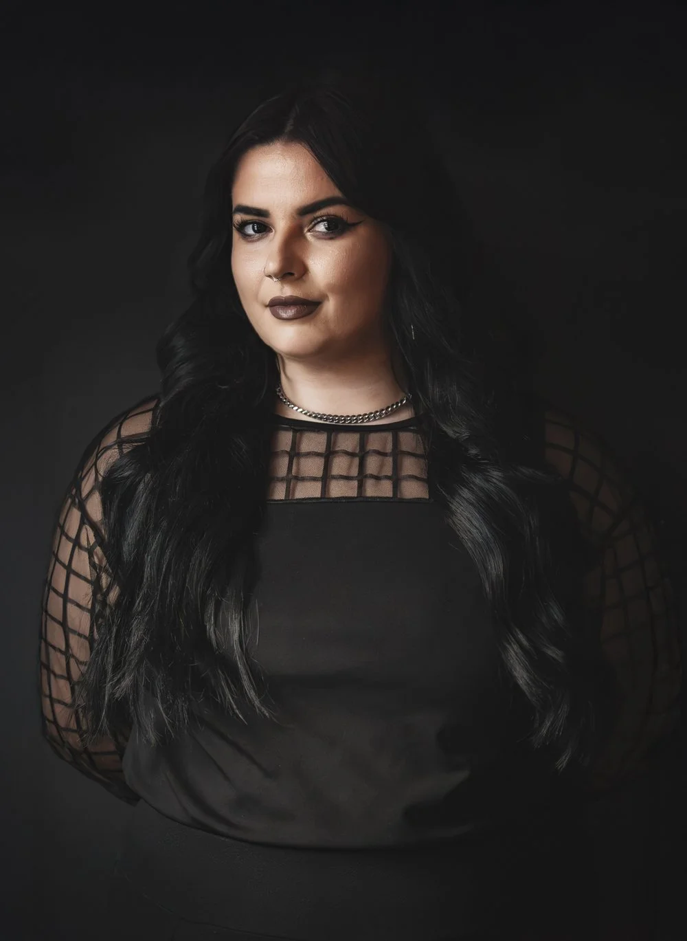 Karly is The Modernist at Alchemy, creating modern haircuts, blonding, custom color and low-maintenance styles in Pittsburgh.