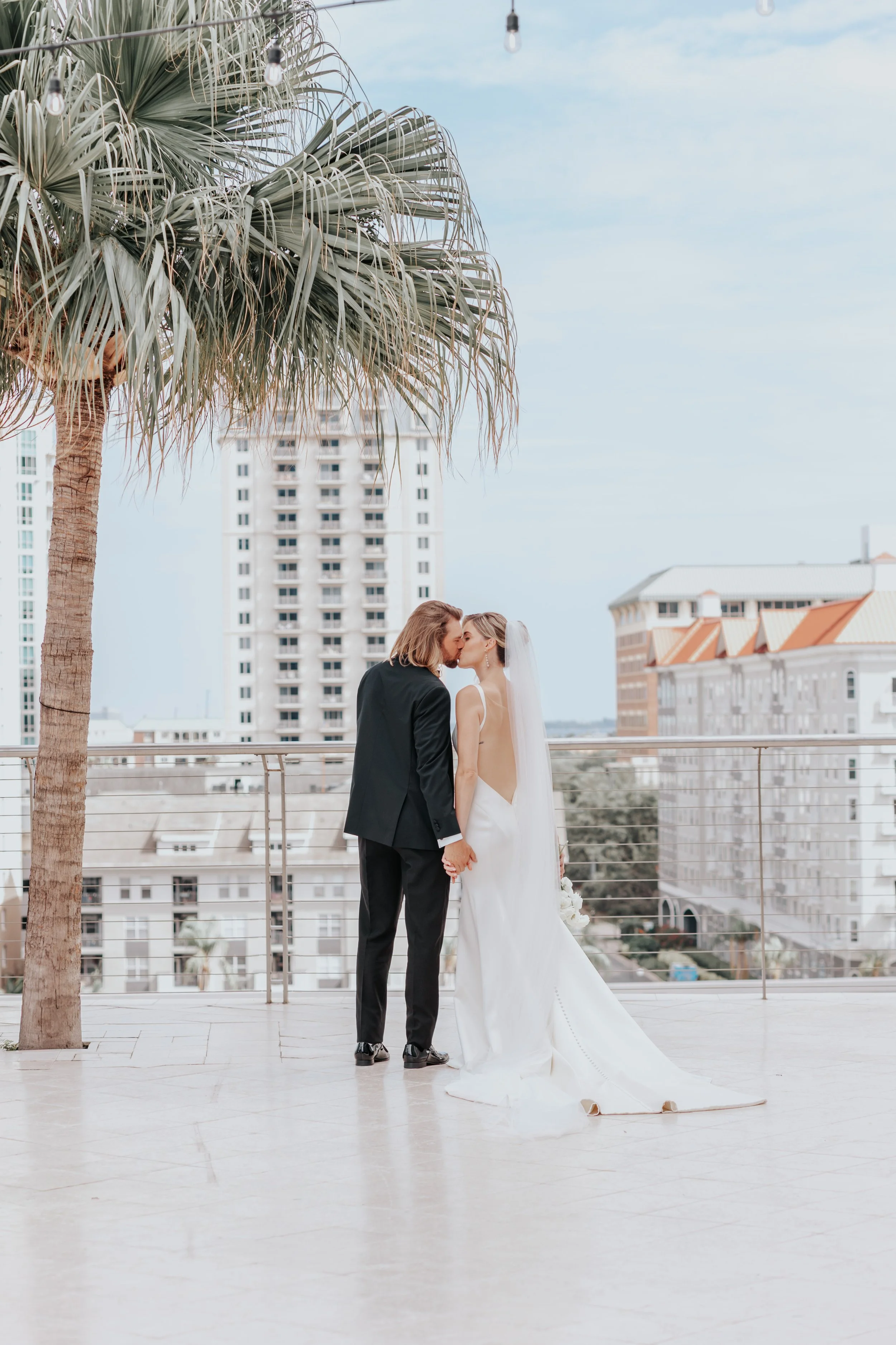 romantic wedding photography in tampa florida featuring soft, natural light and emotional, candid moments captured by tampa wedding photographer photos by milestone