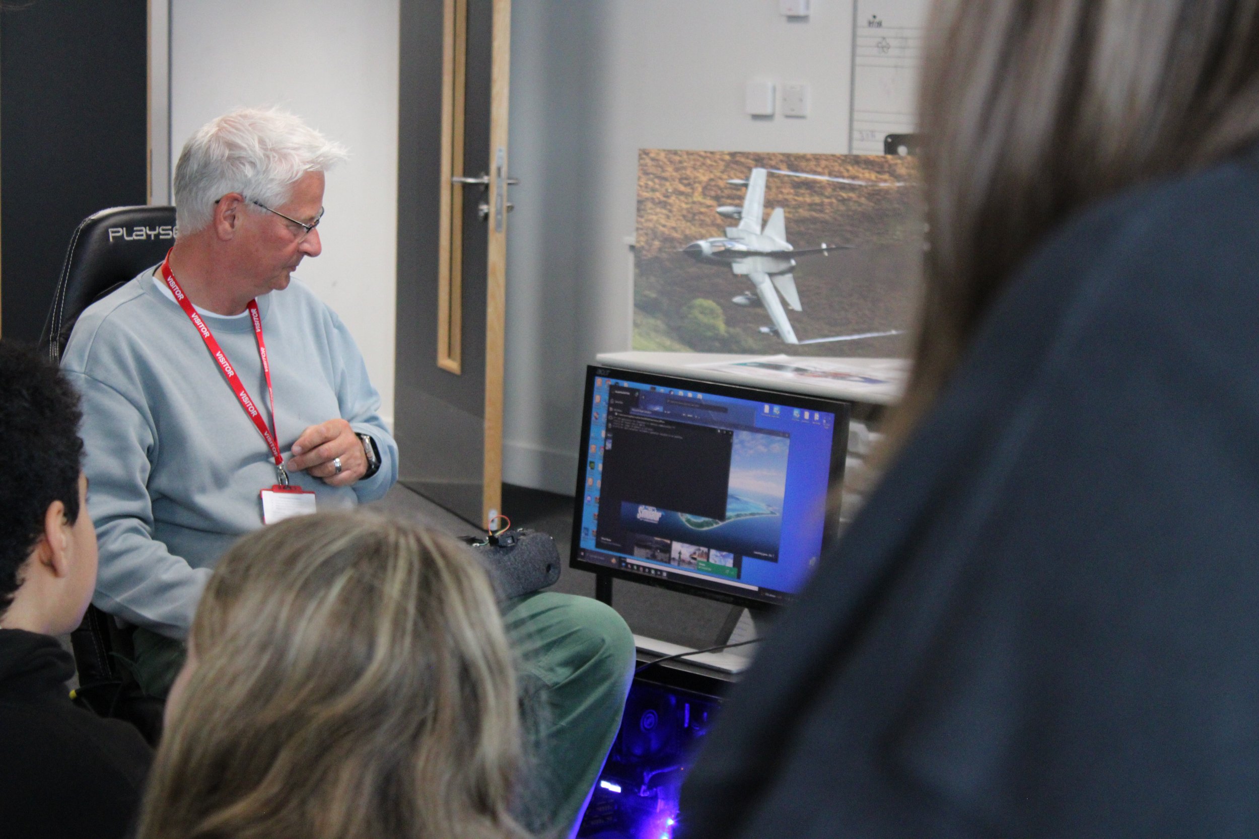 A flight simulator was available for students to try