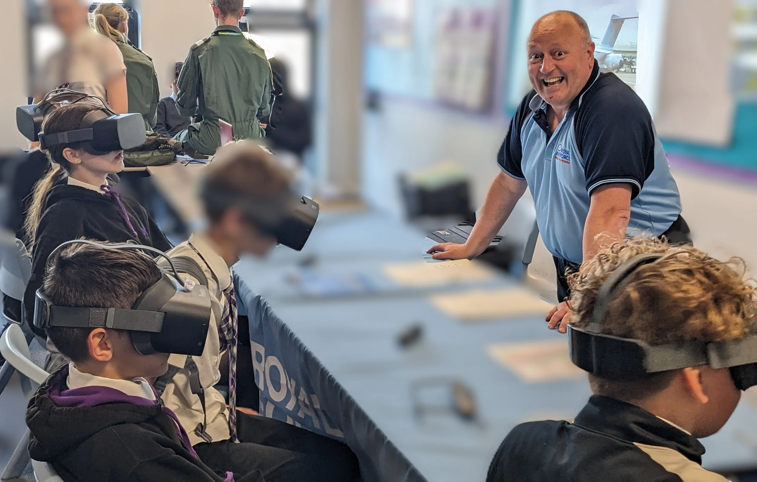 Paul "Dinky" Davis from the RAF brought VR Goggles, a STEM team and young trainees to engage with the young people from Bertha Park High School.