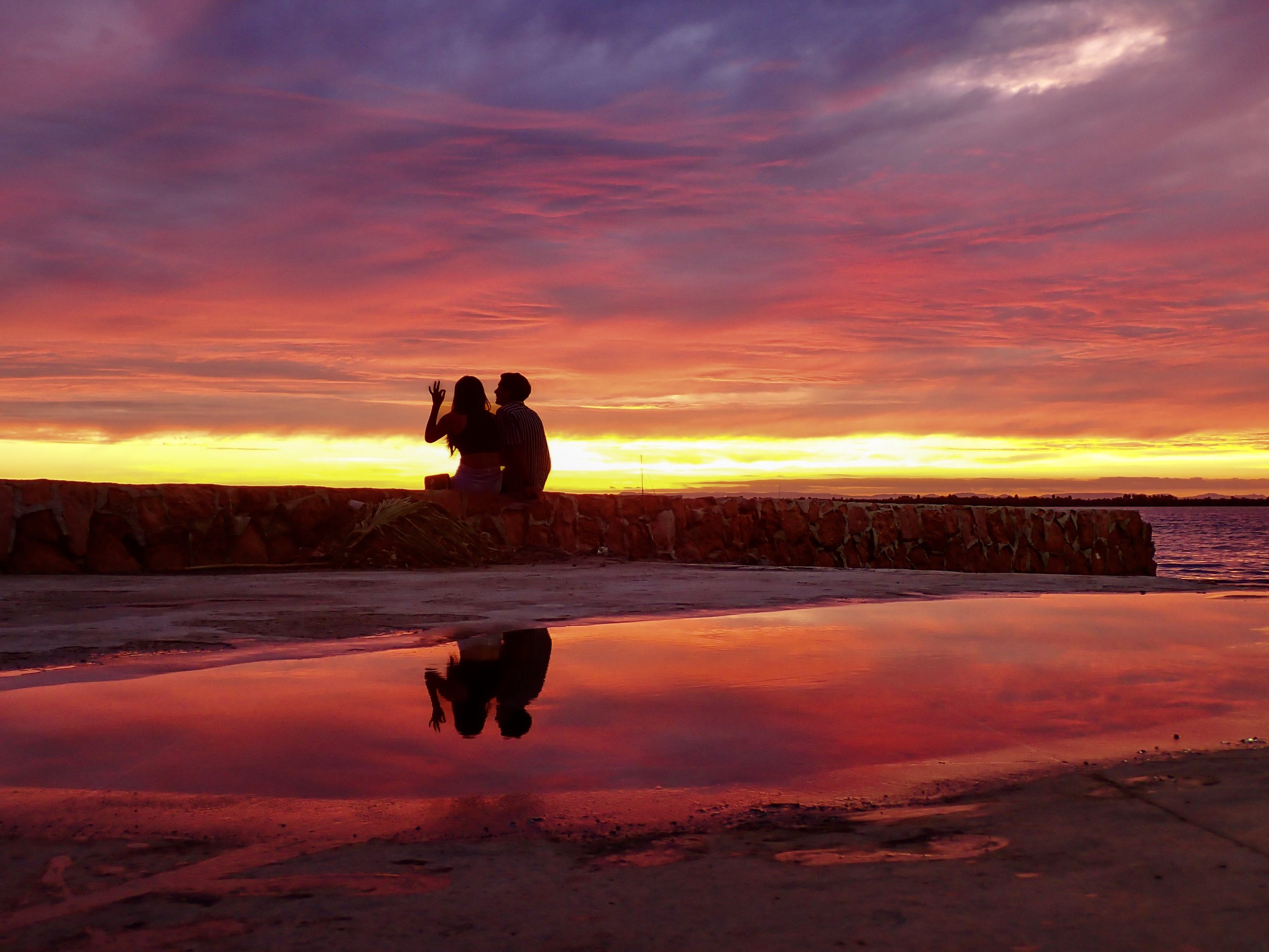 FEBRUARY: Post-hurricane sunset in La Paz, Mexico | Have you noticed storms cause vibrant sunsets and sunrises? I found that it is because heavy rain can clear away pollutants in the air allowing air particles to easily scatter more of the sunset’s v