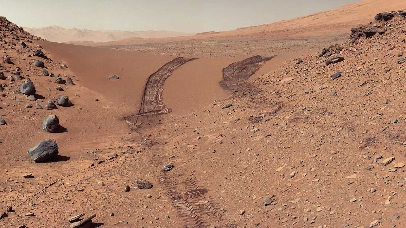 Rover tracks on the surface of Mars
